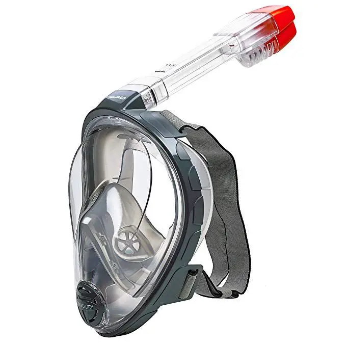 What Makes The Best Full Face Snorkel Mask The full face snorkel mask was first developed and released in 2014. A full face snorkel mask will cover your entire face from forehead to chin. It has two separate sections of which the lower section is for breathing, and the upper part is for viewing. The mask creates a waterproof seal around the edge of your face by using a silicone skirt. They also have wide elasticized straps that make adjusting very easy. The masks are incredibly comfortable during long sessions of snorkeling. The better quality full face snorkel masks do not fog up, and there is no mouthpiece. The snorkel does not sit on the side of the mask, but it is incorporated into the top. The snorkel may look shorter than traditional side snorkels, but the actual height from the water surface is approximately the same. The outside air flows through the snorkel into the lower section of the mask. Leaking and fogging are the two most significant complaints with traditional snorkel masks. Often, it is impossible to prevent fogging. One of the main advantages of using a full face mask is that you can breathe through both your nose and mouth. This is a more natural way of breathing. A full face mask can leak if it's not correctly sized for your face. It is therefore critical to choose the right size to enjoy the full experience of snorkeling. If you love to snorkel then a full face mask is a must. These newly designed snorkeling masks provide an unforgettable and astonishing experience. They are easy to use and more comfortable than traditional models. You also will not notice any jaw fatigue. There will be no gagging or sore teeth from clamping down on a snorkel mouthpiece. head sport full face snorkel mask isometric view OUR REVIEW OF THE HEAD SEA VU DRY FULL FACE SNORKELING MASK One of the better full face snorkel masks on the market today is produced by a company called Head. For example, the Head Sea VU Dry Full Face Snorkeling Mask, which comes in a variety of sizes including small, medium, large, and extra-large, is an excellent high-quality mask. Some of the mask features include a full face window that allows you more visibility than most on the market, a one-way bottom valve that will enable you to clear water, and an internal nasal pocket which provides easy breathing. Other essential features include reduced fogging because of air pathways that are separately vented. These vented air-ways allow exhaling and inhaling air to travel through different paths. The mask comes in a variety of colors including black, pink, white, and gray. This full face mask weighs only 454 g and is exceptionally comfortable when surface snorkeling. The majority of snorkelers who have used a full face mask will never switch back to the traditional mask and snorkel. The Head full face mask uses a dry top snorkel which is a type of ball float that sits inside the snorkel piece. As you dive and become submerged, the ball float will rise up and not allow water to enter into the mask. pink version of head sport full face snorkeling mask CONCLUSION Using this type of dry top snorkel means that you will not need to blow water from the snorkel after you resurface continually. If there is ever a chance that some water does enter the mask area, it will quickly drain out through a valve that is located in the chin area as soon as your face rises above the water level. This Head full face mask is one of the more popular snorkeling masks on the market today.